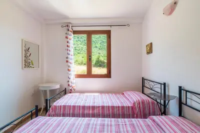 Letto o letti in una camera di Casa del Sole