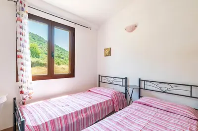 Letto o letti in una camera di Casa del Sole