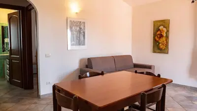 Area soggiorno di Casa Vacanza la Suaredda