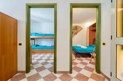 Letto o letti in una camera di House 8 beds overlooking a pine forest at just 600 mt from the sea