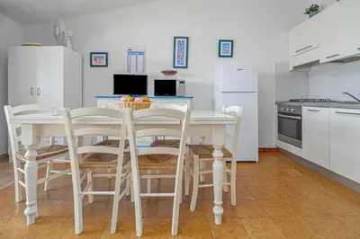 Cucina o angolo cottura di Marineledda appartamento le conchiglie