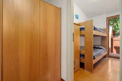Letto o letti in una camera di Marineledda appartamento le conchiglie