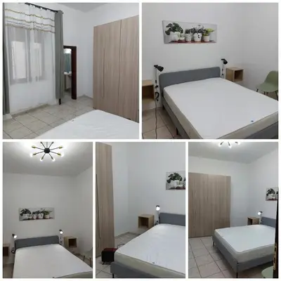 Letto o letti in una camera di Maria Pasqualina Vacation Home