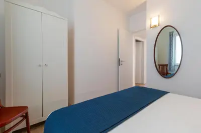 Letto o letti in una camera di Rita's House