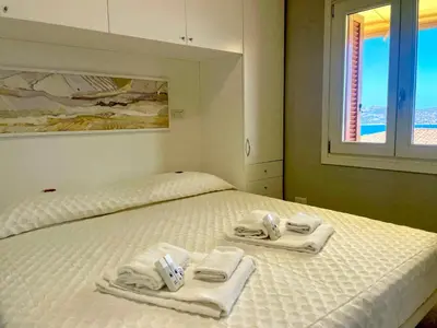 Letto o letti in una camera di Monolocale Terrazza Vista Mare