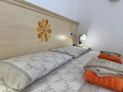 Letto o letti in una camera di Vistamare