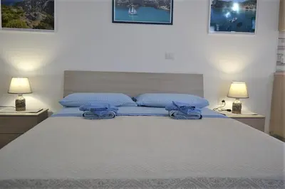 Letto o letti in una camera di Vistamare