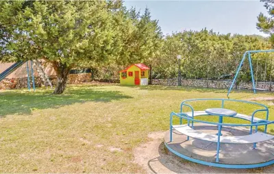 Area giochi per bambini di Apartments in Baia de Bahas Golfo di Marinella