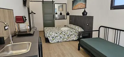 Letto o letti in una camera di Derosas House