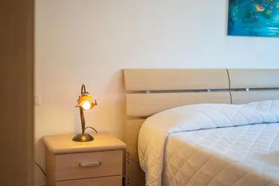 Letto o letti in una camera di Casa delle Sorgenti 2