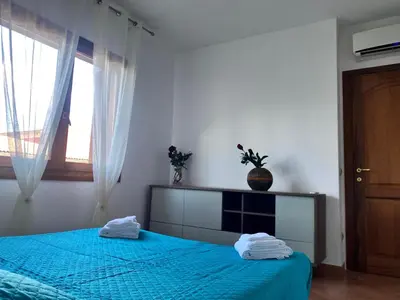 Letto o letti in una camera di Rose House