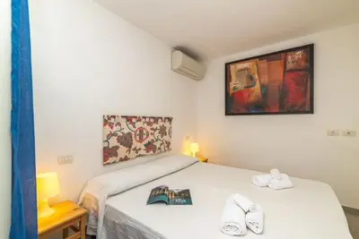 Letto o letti in una camera di Casa Ibiscus