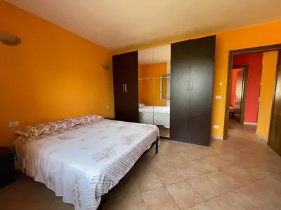 Letto o letti in una camera di Casa Rosanna