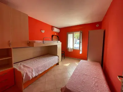 Letto o letti in una camera di Casa Rosanna