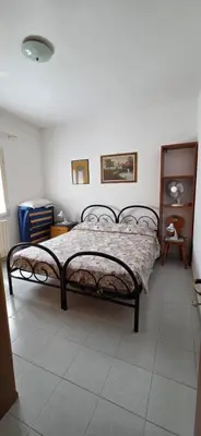 Letto o letti in una camera di Casa ERMINIA