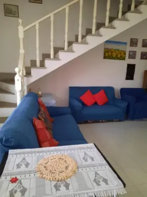 Area soggiorno di Casa ERMINIA
