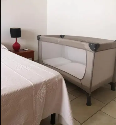 Letto o letti in una camera di Tra blu e verde