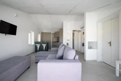 Area soggiorno di Romantic Apartment with Terrace by Wonderful Italy