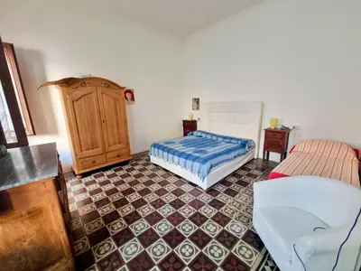 Letto o letti in una camera di Casa Manconi