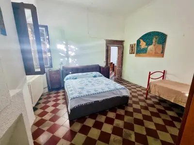 Letto o letti in una camera di Casa Manconi