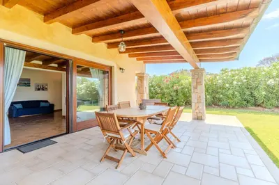 Balcone o terrazza di Villa Capo Coda Cavallo con Piscina