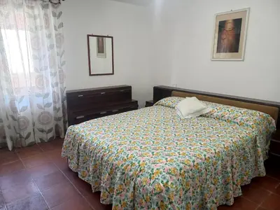 Letto o letti in una camera di Le Rose