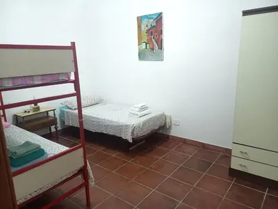Letto o letti in una camera di Le Rose