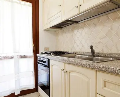 Cucina o angolo cottura di SardegnaSummer Il Borgo Porto San Paolo