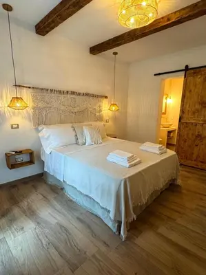Letto o letti in una camera di Domo s eliga