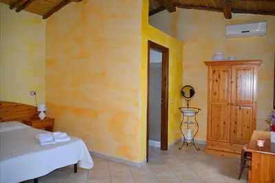Letto o letti in una camera di Agriturismo Rubinu