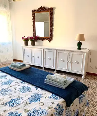 Letto o letti in una camera di Apartment in Olbia by the sea