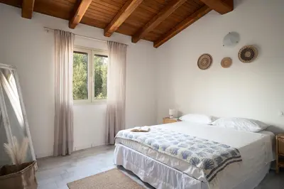 Letto o letti in una camera di Casa Esmeralda