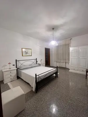 Letto o letti in una camera di Bed and Breakfast Santu Tomas