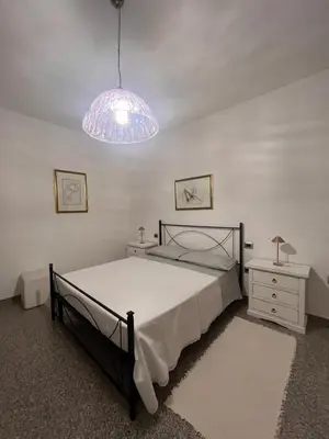Letto o letti in una camera di Bed and Breakfast Santu Tomas