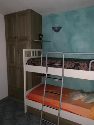 Letto o letti in una camera di Sardegna colori e profumi
