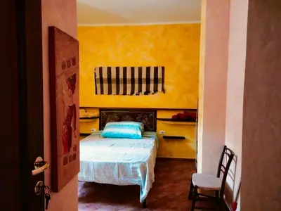 Letto o letti in una camera di Casa Rustica
