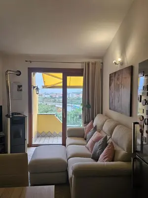 Area soggiorno di FabHouse Olbia