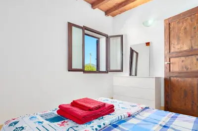 Letto o letti in una camera di Villa Marianna - Almiddina