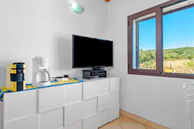 TV o dispositivi per l'intrattenimento presso Villa Marianna - Almiddina