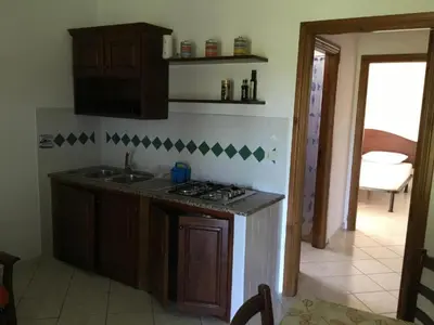 Cucina o angolo cottura di Appartamenti a Sa Serra di Orosei