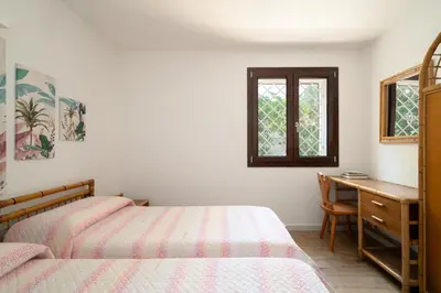 Letto o letti in una camera di Villa Olivastro by Klodge