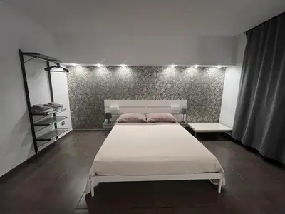 Letto o letti in una camera di Via Romana 1 camera con bagno