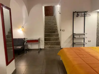 Letto o letti in una camera di Via Romana 1 camera con bagno