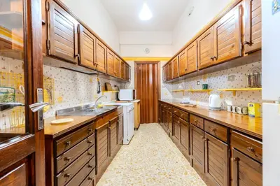 Cucina o angolo cottura di - Olbia City Center - Regina Margherita Apartment