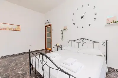 Letto o letti in una camera di Downtown View - AP Margherita -