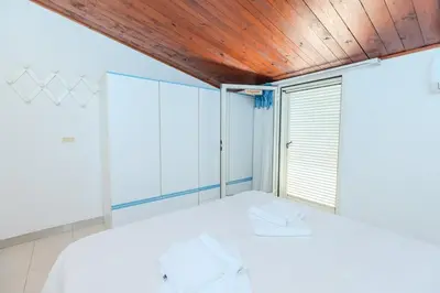 Letto o letti in una camera di Grazia Deledda - Oasis of Relaxation -