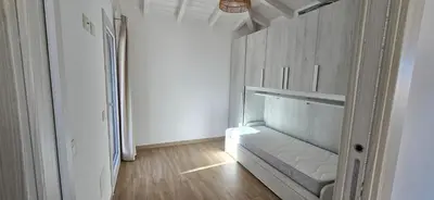 Letto o letti in una camera di Casa Perla