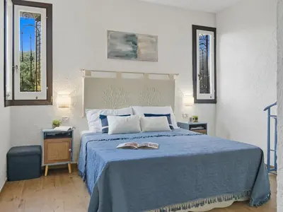 Letto o letti in una camera di Apartment Iris 5- Terza Spiaggia by Interhome