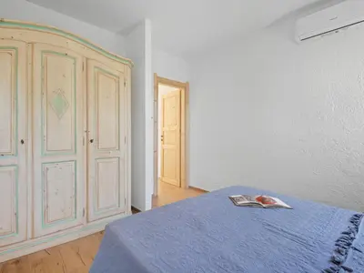 Letto o letti in una camera di Apartment Iris 5- Terza Spiaggia by Interhome