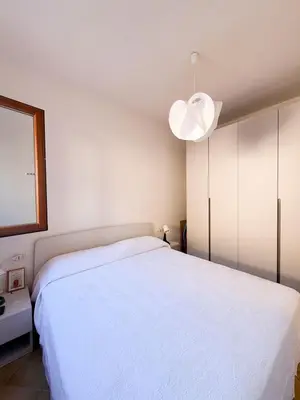 Letto o letti in una camera di Two-room apartment in the heart of Golfo Aranci